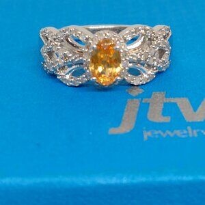 Spessartite garnet, & diamond ring